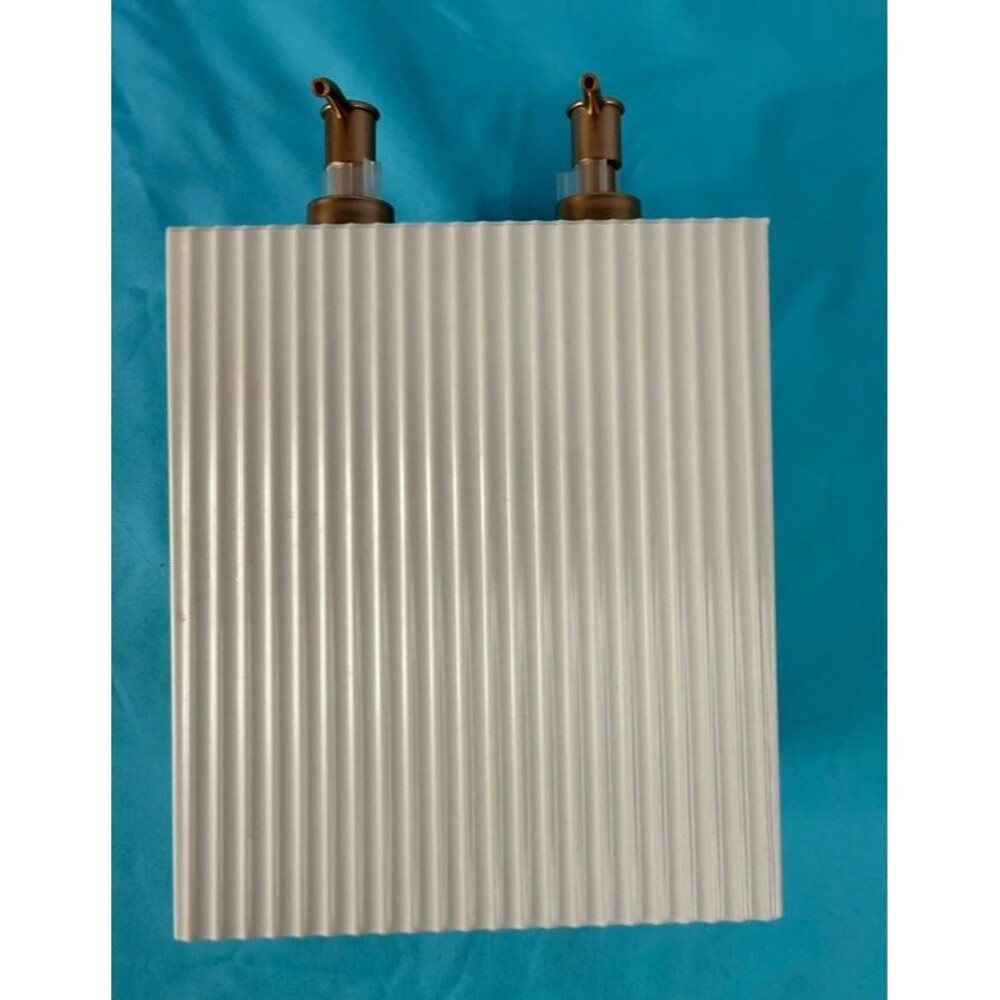 Cream colored ribbed dual-pump soap and lotion dispenser